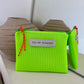 POCHETTE EN MESH FLUO